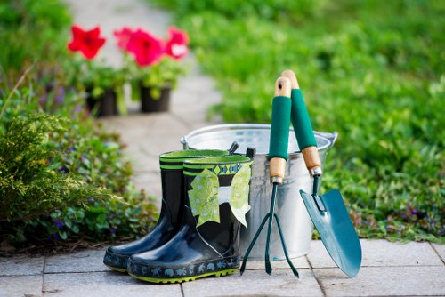Refined Redbridge garden landscaping with structured outdoor features