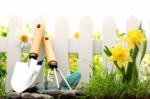 Team member assessing landscaping work issues
